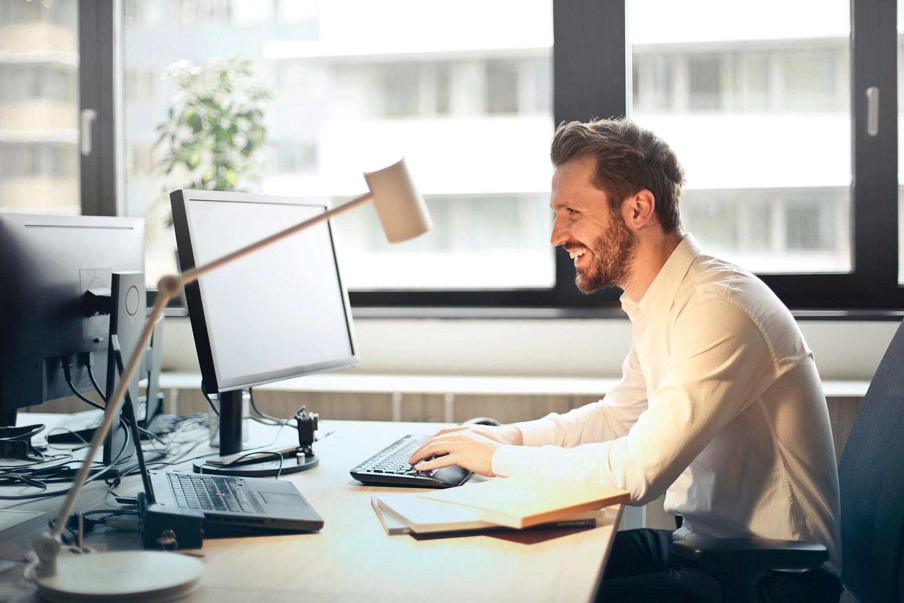 Man-at-desk - Epic Office Furniture