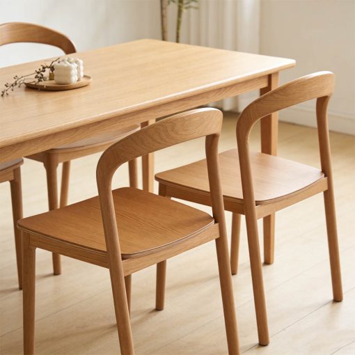 Nodo timber chair at dining table in-situ
