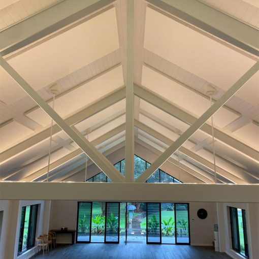 White quietspace panels on ceiling of yoga hall